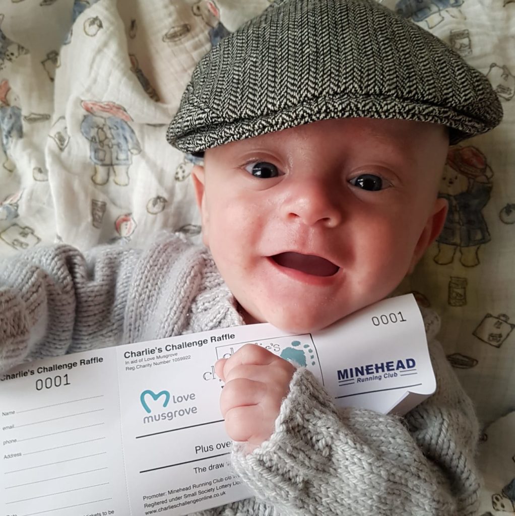 Charlie's Challenge - Baby with Fundraising Cheque